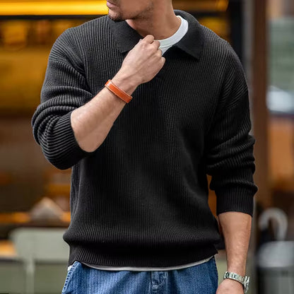 A stylish black ribbed knit sweater